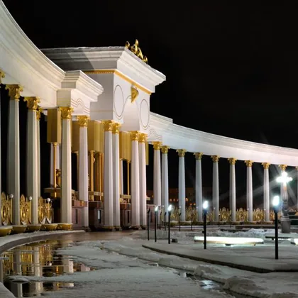 Night view of a landmark in Almaty